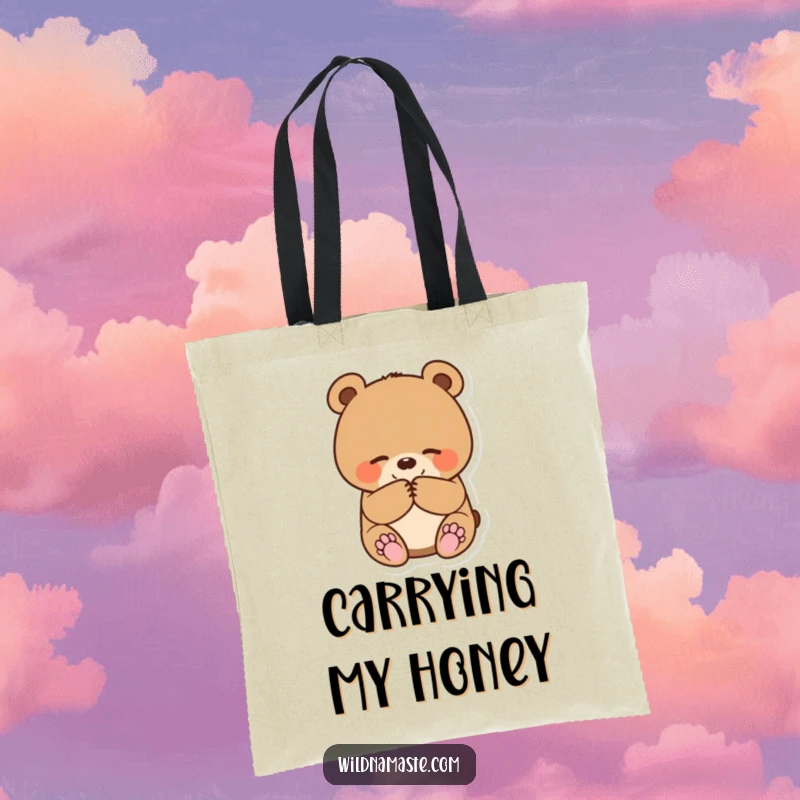 Funny tote bag featuring a small, round bear cub bowing happily with paws together, perfect for stylish carrying.